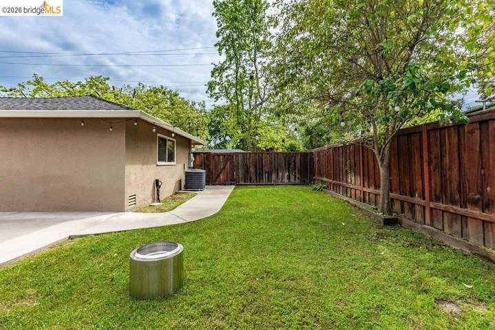 View of fenced backyard