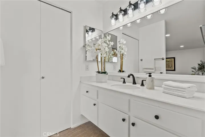 Primary bathroom with closet.
