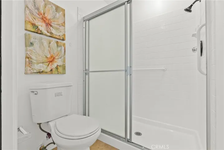 Primary bathroom with walk-in shower.