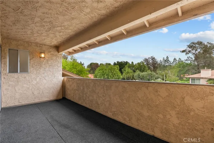 Spacious balcony with lighting