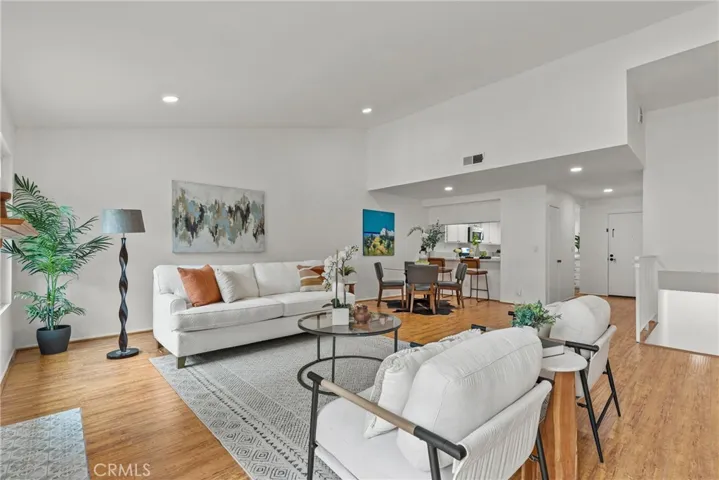 Family room with dining area open to kitchen.