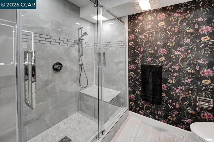 luxury primary shower w bench