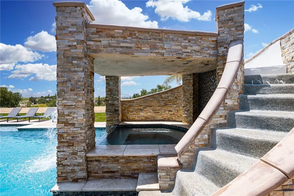 Grotto w/ waterfall and slide