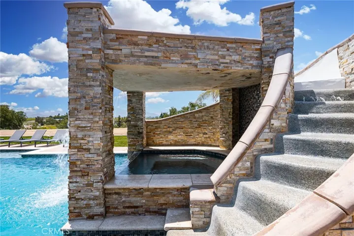 Grotto w/ waterfall and slide
