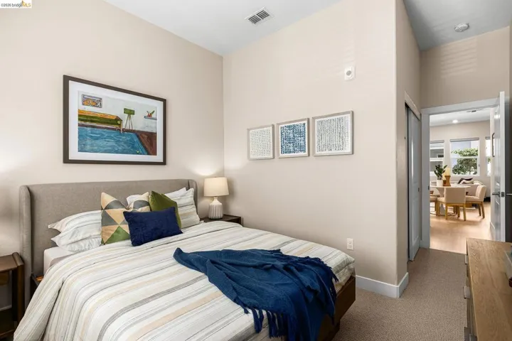 Bedroom with baseboards and carpet floors
