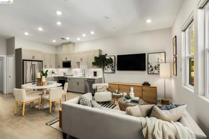 Living room featuring light wood-style floors and recessed lighting