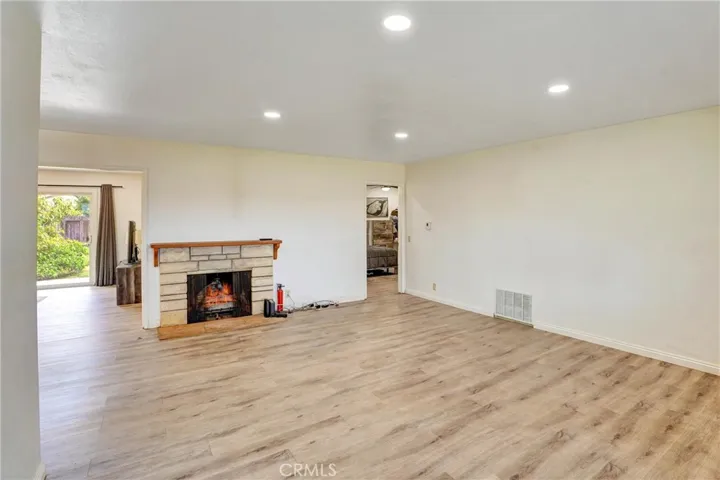 Open floor plan with luxury vinyl flooring. and canned lighting.