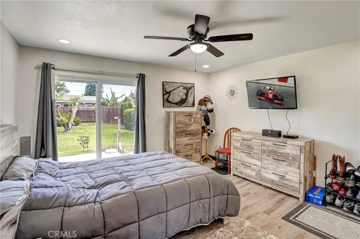 Primary Suite with sliders to rear yard.