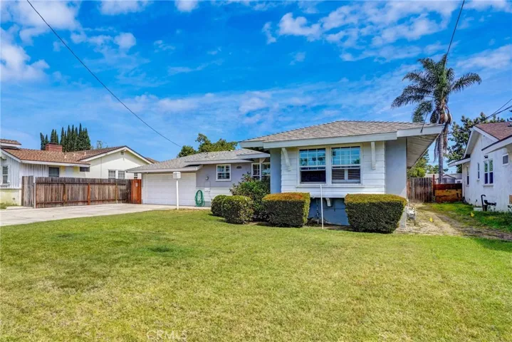 Located on large lot, both front and rear.