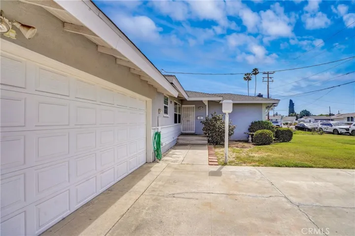 Attached garage with direct house access and RV parking possibilities.