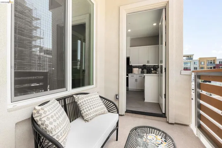 Property entrance featuring a balcony