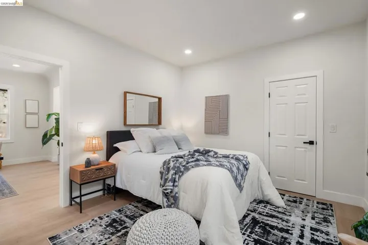 Bedroom featuring light wood finished floors and recessed lighting