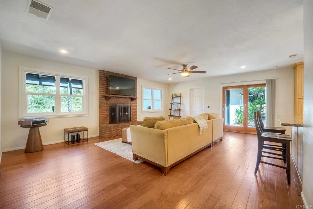 The kitchen & family room are ideal for entertaining, the slider leads onto the pergola patio.