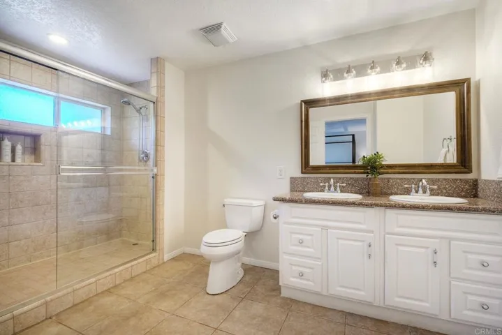 Primary ensuite. Dual sinks, walk-in shower