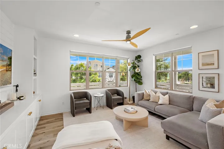 Spacious living room filled with natural light.