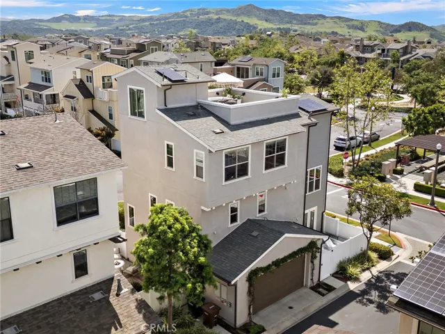 Aerial view of expansive corner lot overlooking mountains