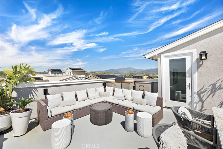 Private rooftop lounge blending comfort with scenic surroundings.