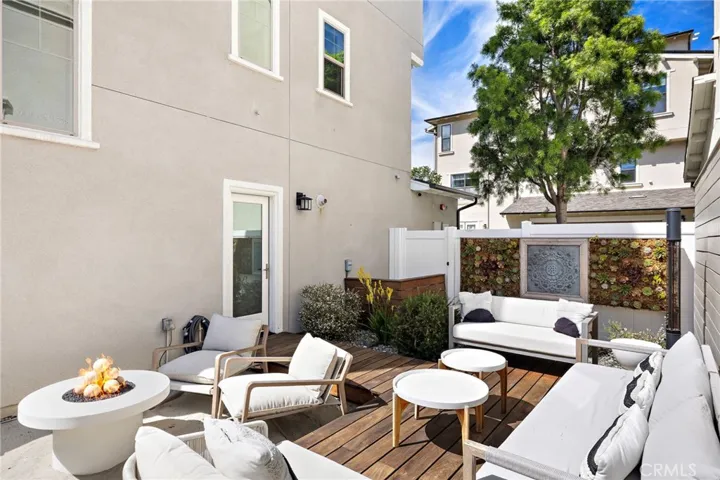 Outdoor seating area balancing comfort, warmth, and privacy.