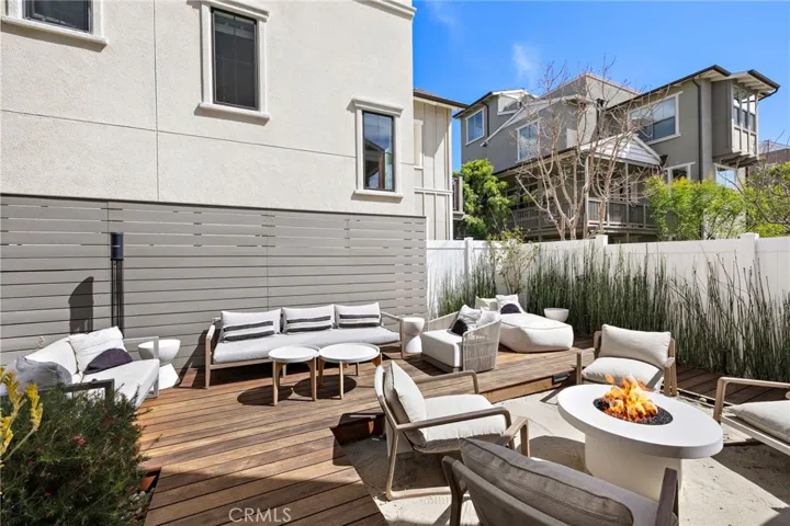 Backyard lounge offering a refined setting for entertaining or relaxation.