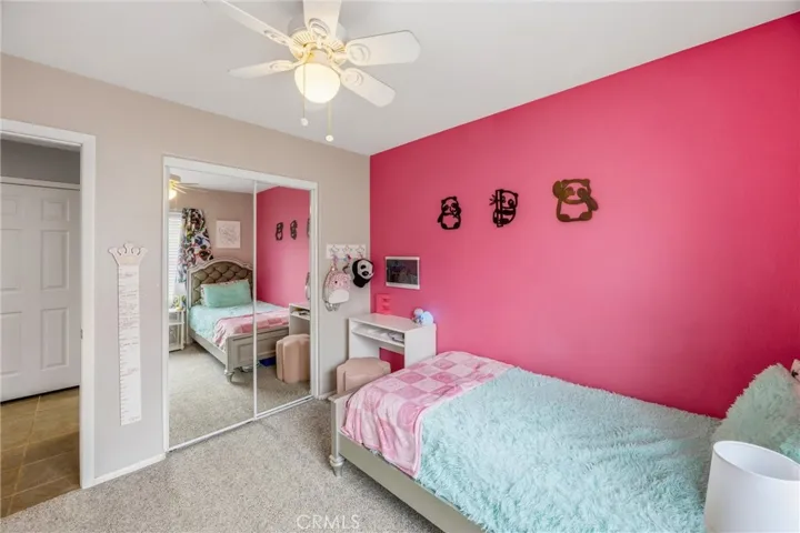 Bedroom with mirrored closet