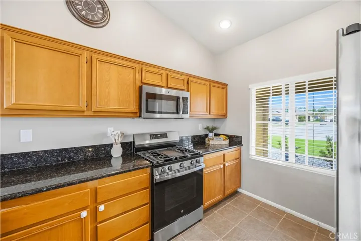 Kitchen with window overlooking front yard