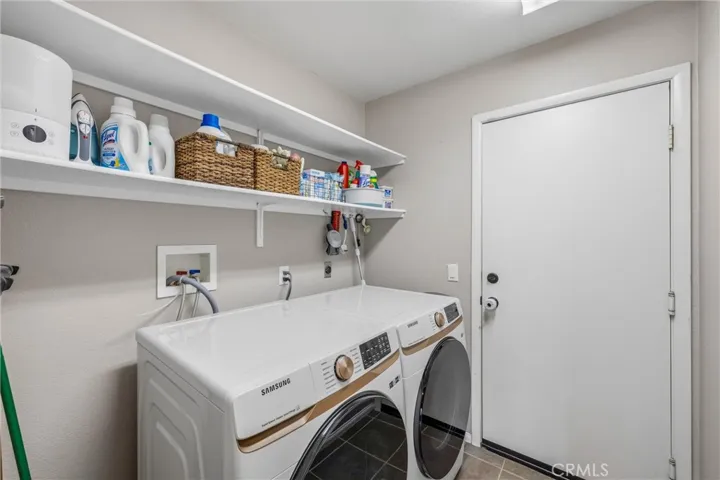Laundry room with plenty of storage