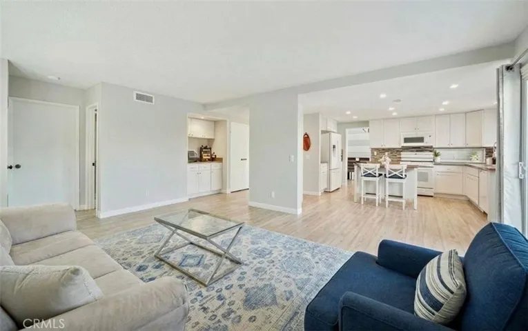 Family Room  - 27301 Monforte, M.V. 92692 Virtually Enhanced