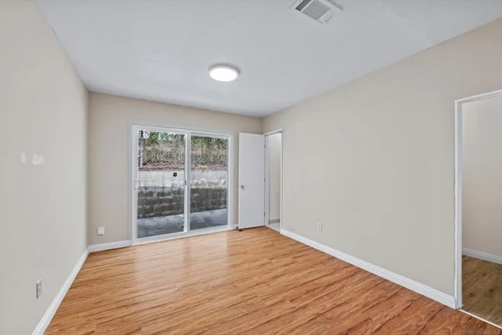 Bedroom 3 has walk-in closet and stacked washer/dryer laundry room