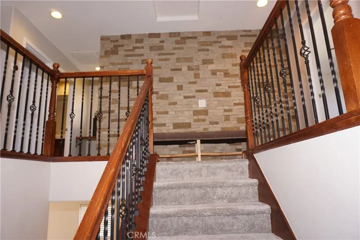 Designer Wall at Top of Stairs