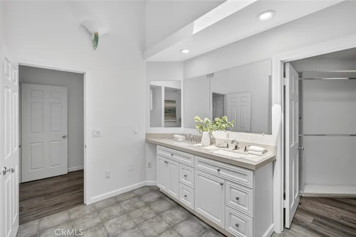 Bathroom in Primary Suite with walk-in closet