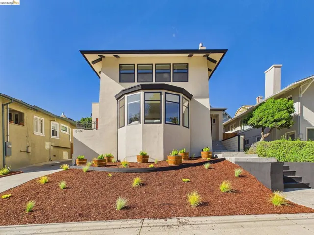 View of front of home featuring stucco siding