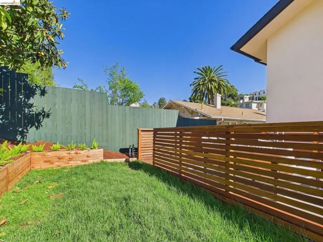 View of fenced backyard