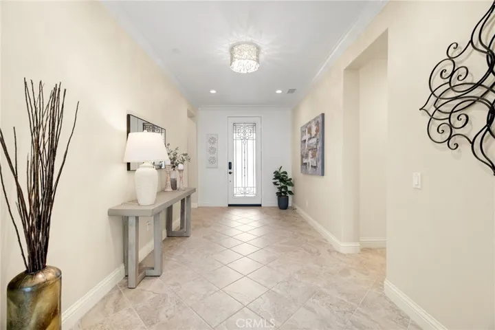 Front door. Left hallway: 2 Secondary bedrooms & secondary bathroom. Right hallway: JR suite