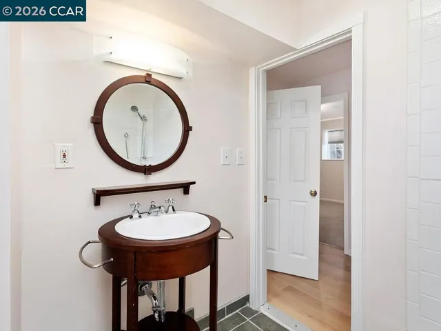 Full bathroom 3 includes shower, adjacent to bedroom 3.