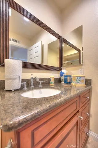 Upgraded vanity with an undermount sink, granite top!