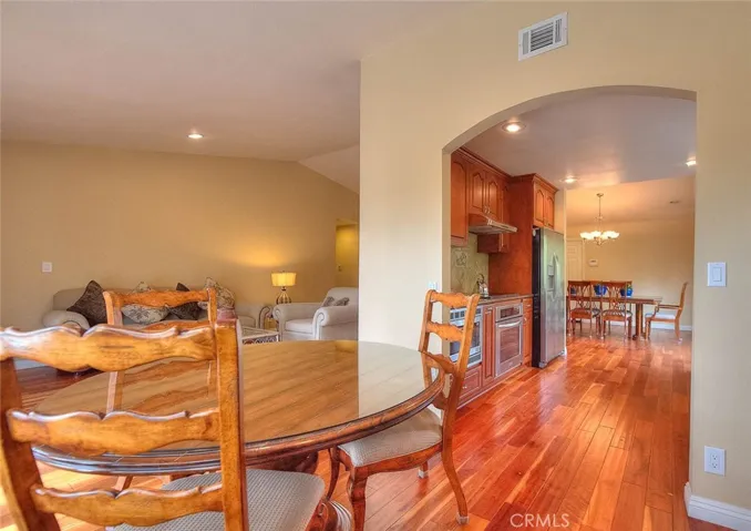 Dining room adjacent to the kitchen and family room