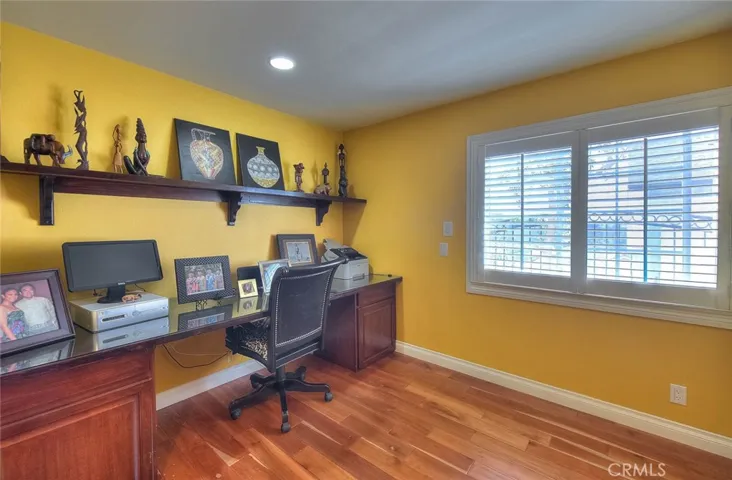 Built in desk, view to the side yard.  Recessed lights