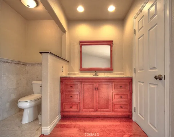 New toilet and tiled walls