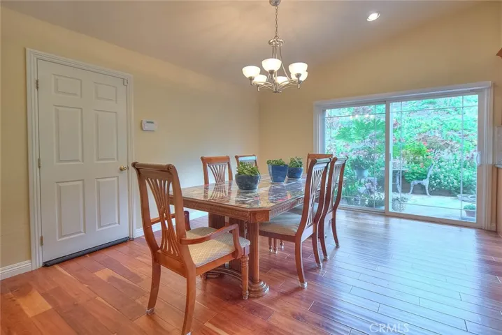 Sliding door is dual paned and goes to the side yard