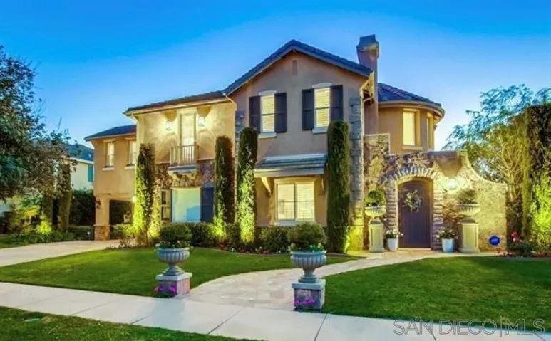 Evening view of this stunning Encinitas Ranch Home on the 11th fairway