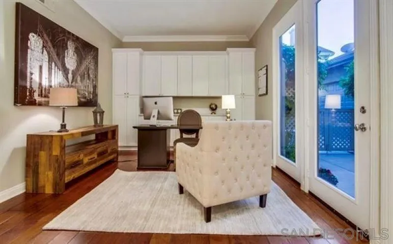 Spacious office with a door to the courtyard