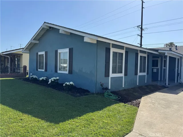 Front of home with New Flowers/Plants