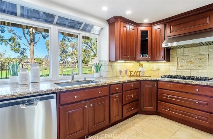 Kitchen has it all, size, upgrades and pool and golf course views.