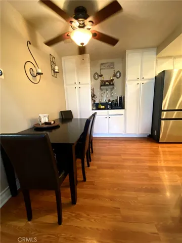 The dining room offers ample storage space and spacious cabinets.