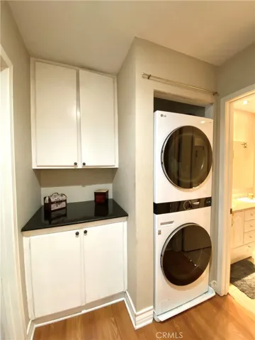 At the end of the hallway is a linen closet with a granite folding area and a full-size laundry room that is only a few years old and in exceptional condition.