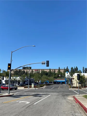 There are shops, restaurants and services across the street, so you can walk there for your morning coffee and breakfast. You can even see Costco sign right above LA Paz Street sign.