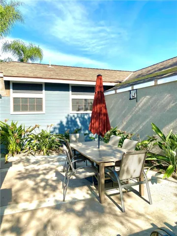 The seating area by the pool is perfect for summer lunches and small parties.