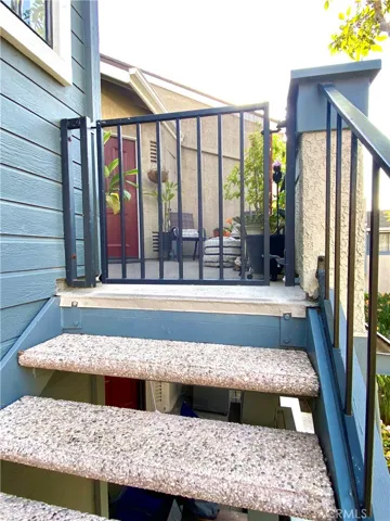 At the top of the stairs you have the gate that keeps your pets inside.