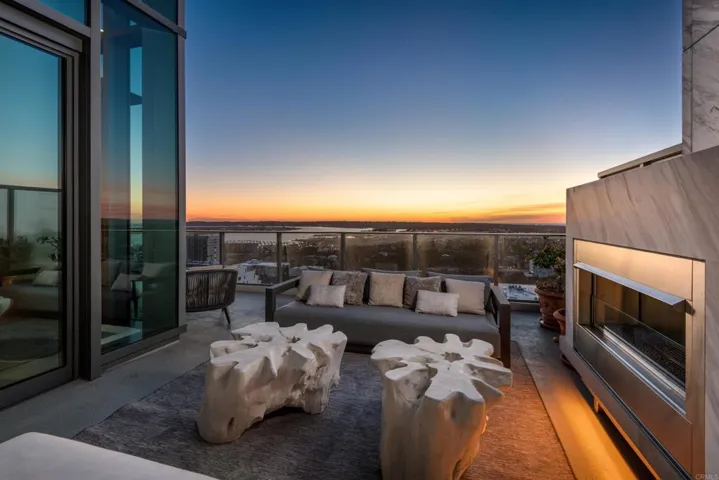 Main balcony has comfortable seating areas and a fireplace.