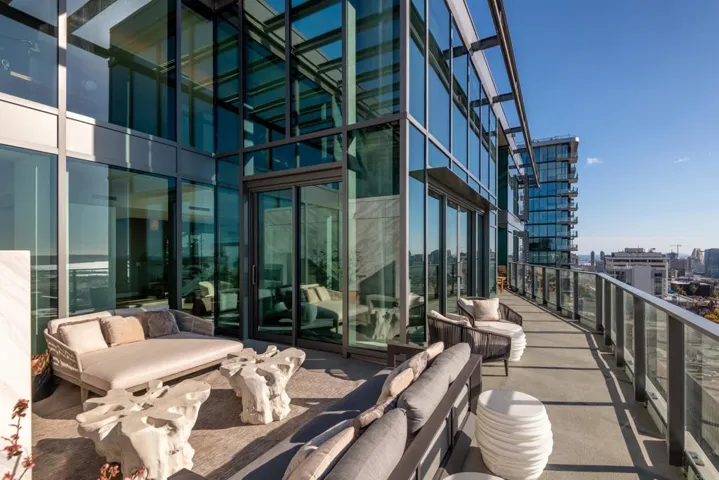 Perched atop the coveted southwest corner, the impressive main balcony is ideal to entertain guests.